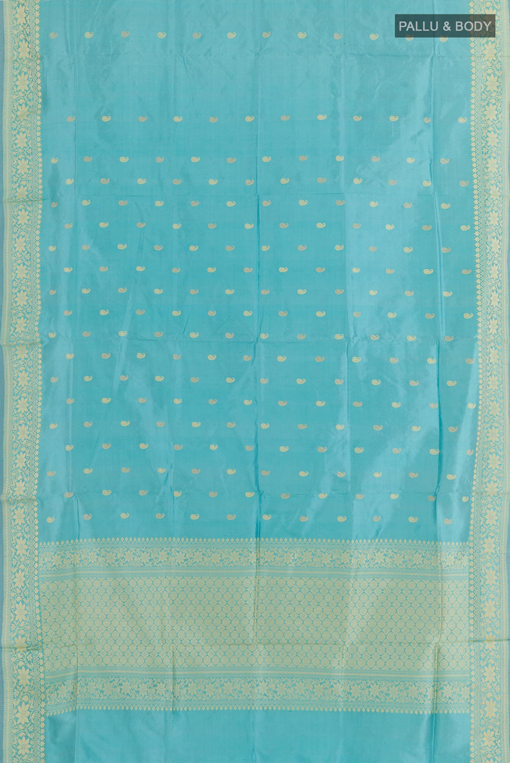 Flat view of Blue Banarasi Katan Silk Saree with Zari Butta on the body and Zari Border. 