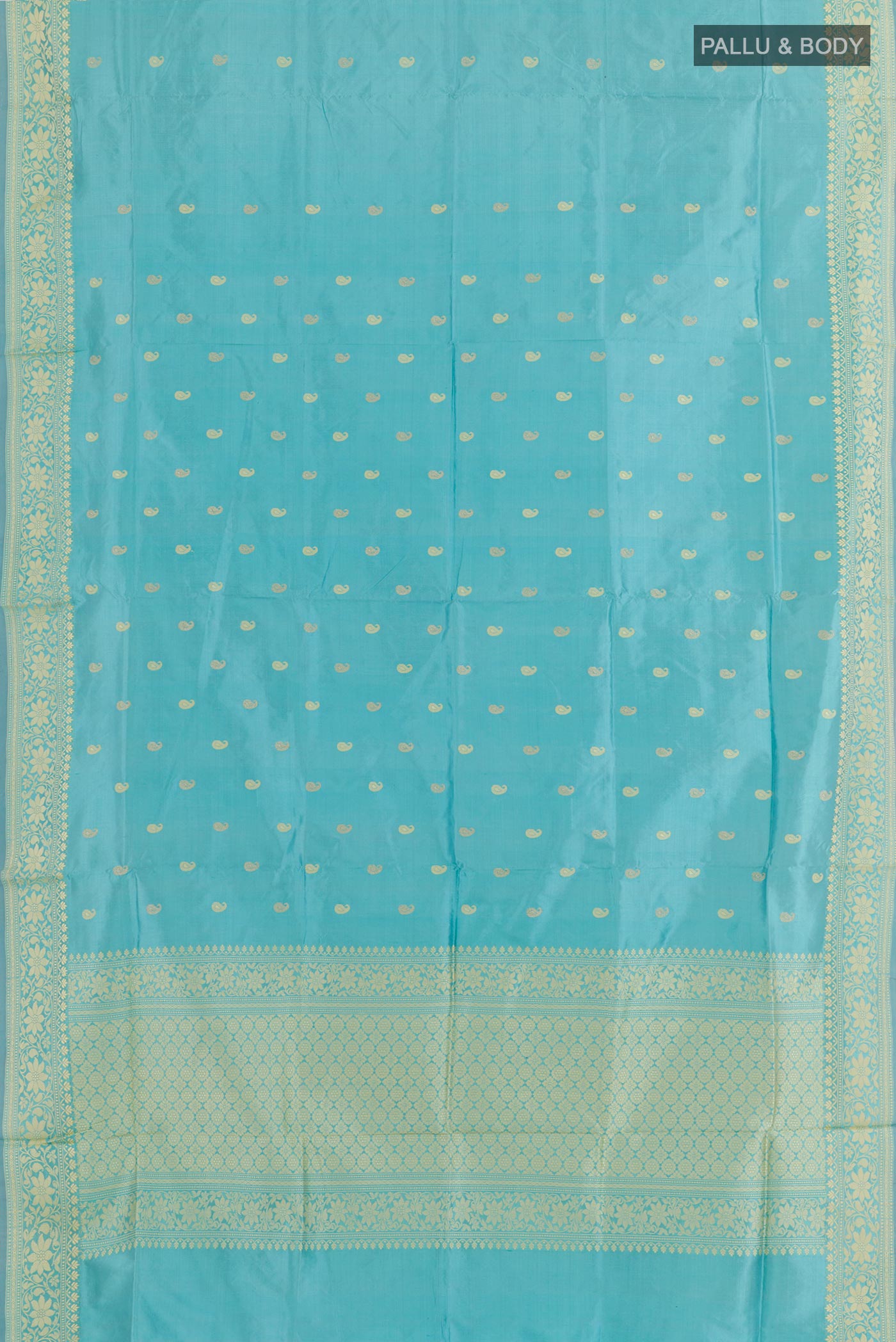 Flat view of Blue Banarasi Katan Silk Saree with Zari Butta on the body and Zari Border. 