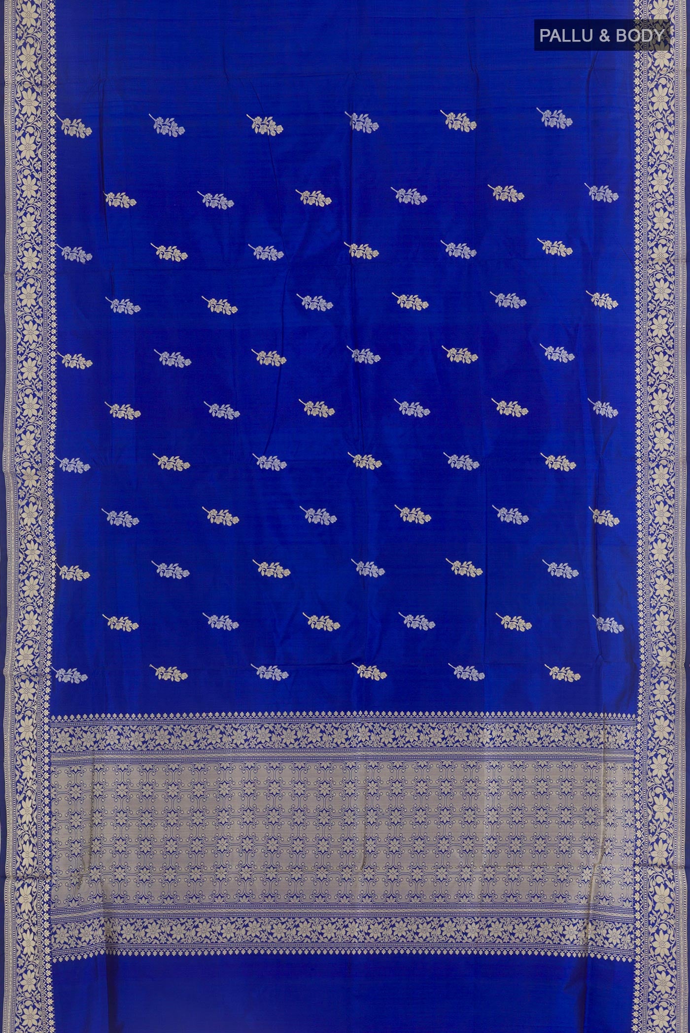 Flat view of Blue Banarasi Katan Silk Saree with Zari Butta on the body and Zari Border. 