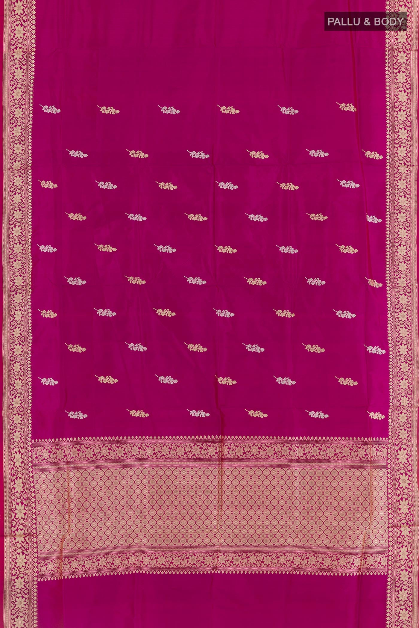 Flat view of Purple Banarasi Katan Silk Saree with Zari Butta on the body and Zari Border. 