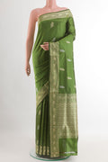 Green Banarasi Katan Silk Saree with Zari Butta on the body and Zari Border.  displayed on a mannequin