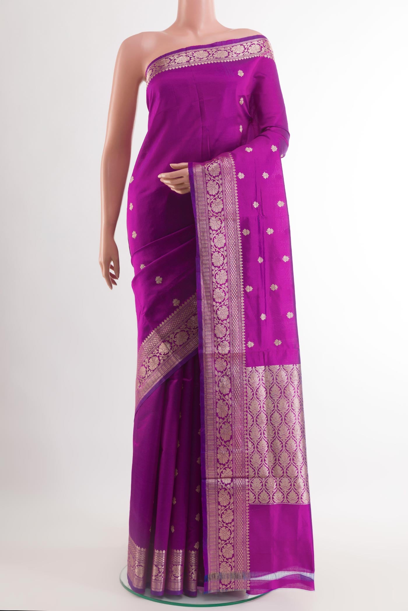 Purple Banarasi Katan Silk Saree with Zari Butta on the body and Zari Border.  displayed on a mannequin