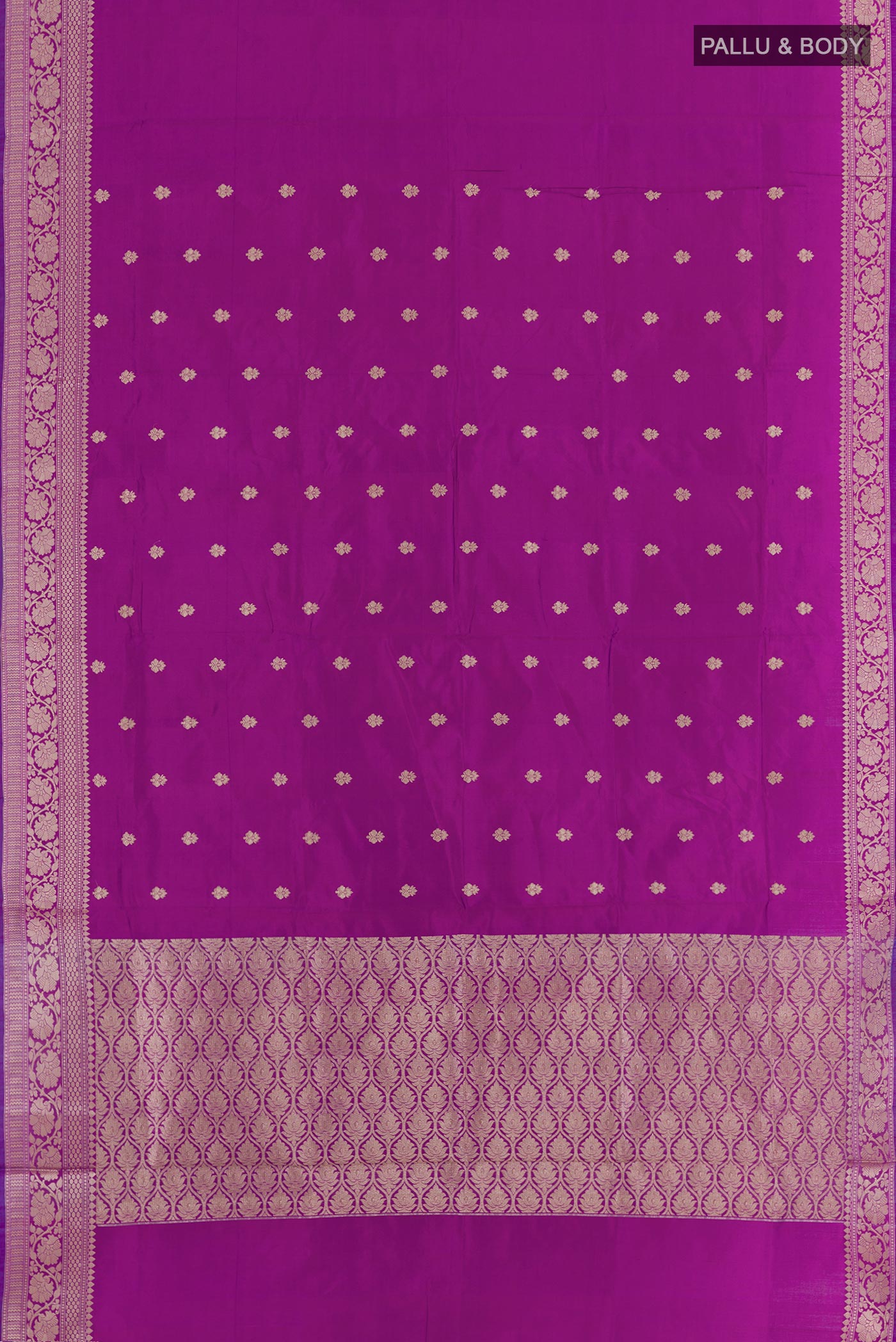 Flat view of Purple Banarasi Katan Silk Saree with Zari Butta on the body and Zari Border. 