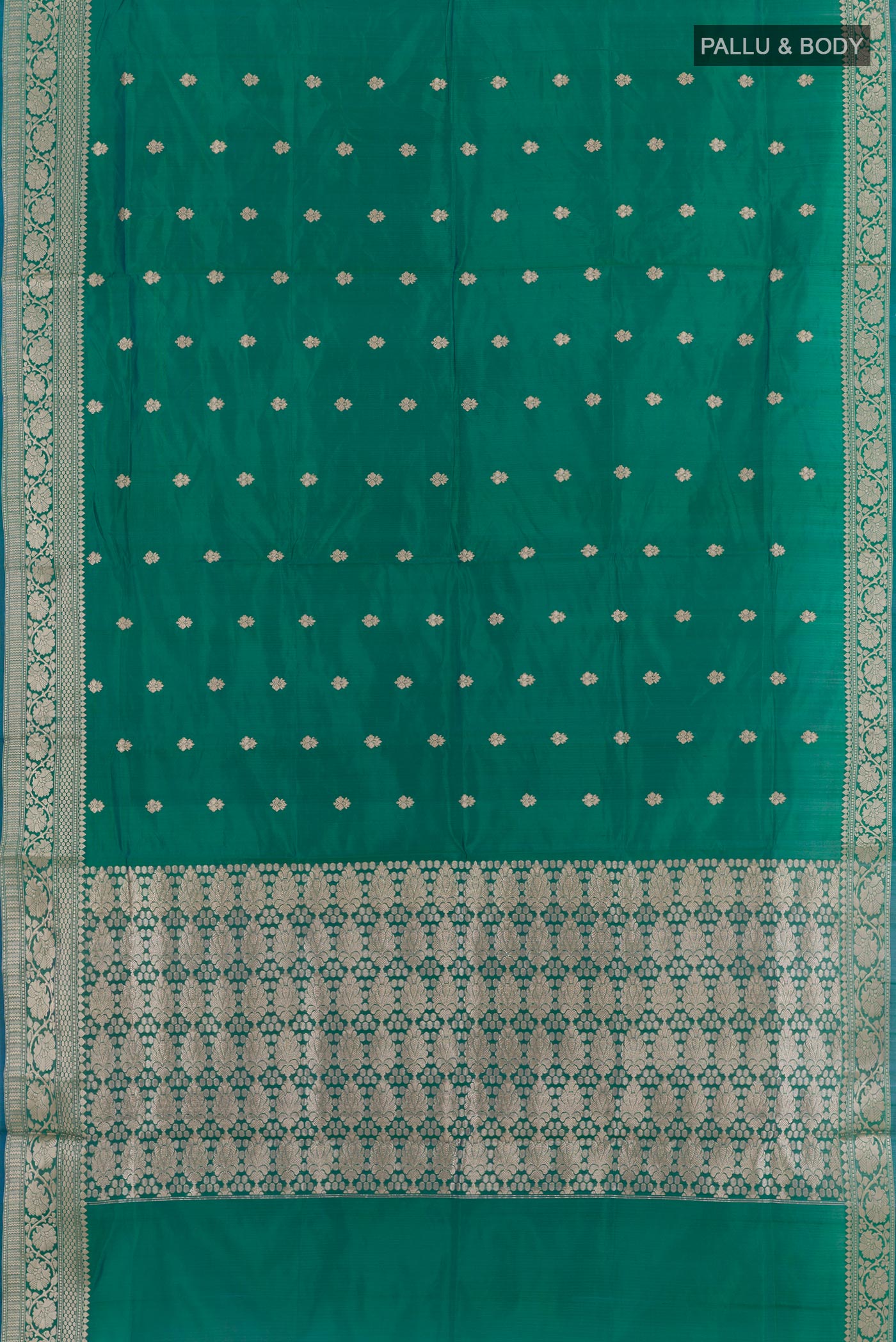 Flat view of Green Banarasi Katan Silk Saree with Zari Butta on the body and Zari Border. 