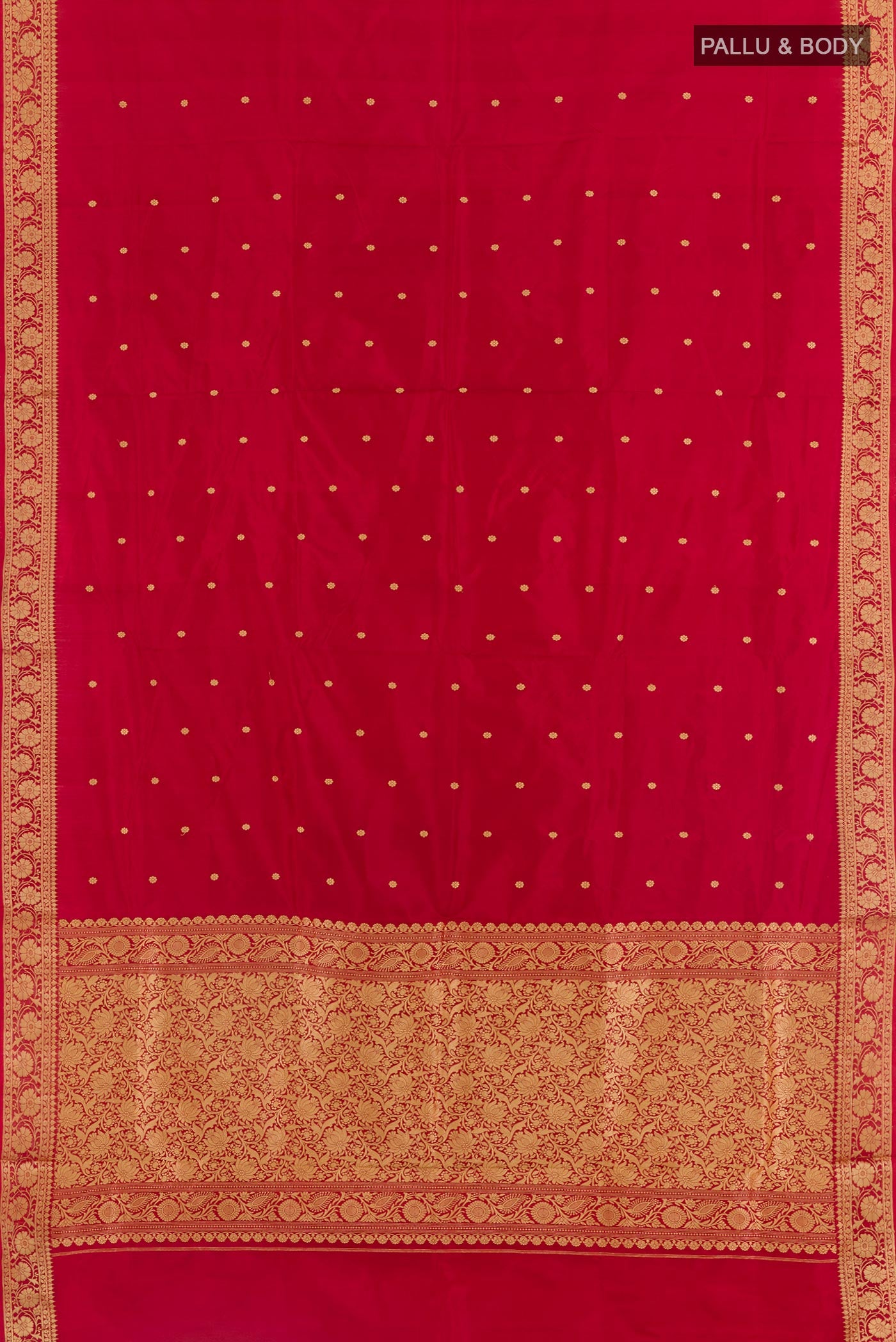 Flat view of Red Banarasi Katan Silk Saree with Zari Butta on the body and Zari Border. 