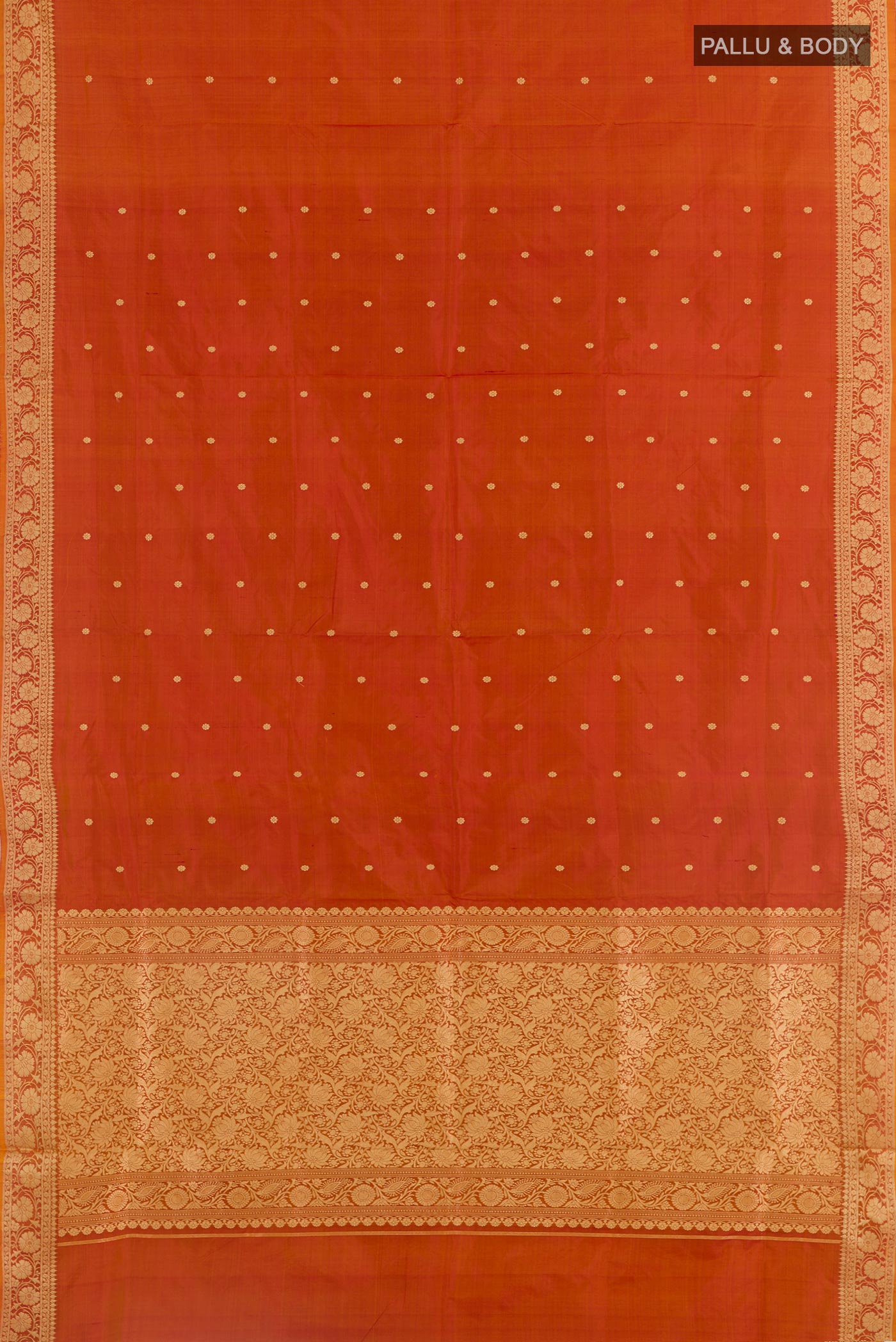 Flat view of Orange Banarasi Katan Silk Saree with Zari Butta on the body and Zari Border. 