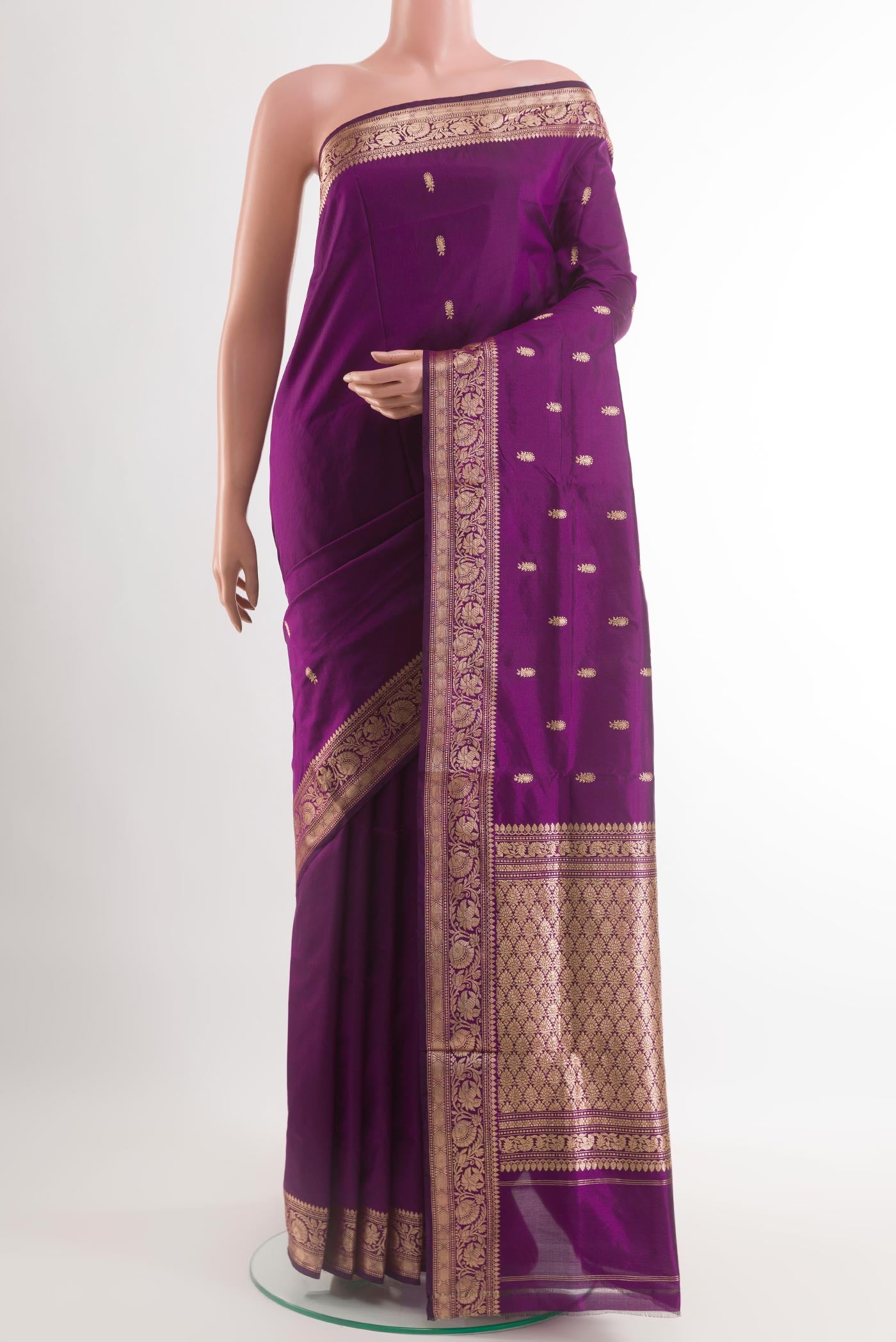Purple Banarasi Katan Silk Saree with Zari Butta on the body and Zari Border.  displayed on a mannequin