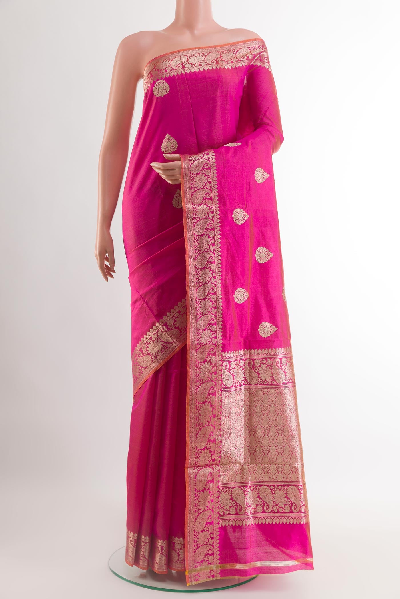 Pink Banarasi Katan Silk Saree with Zari Butta on the body and Zari Border.  displayed on a mannequin