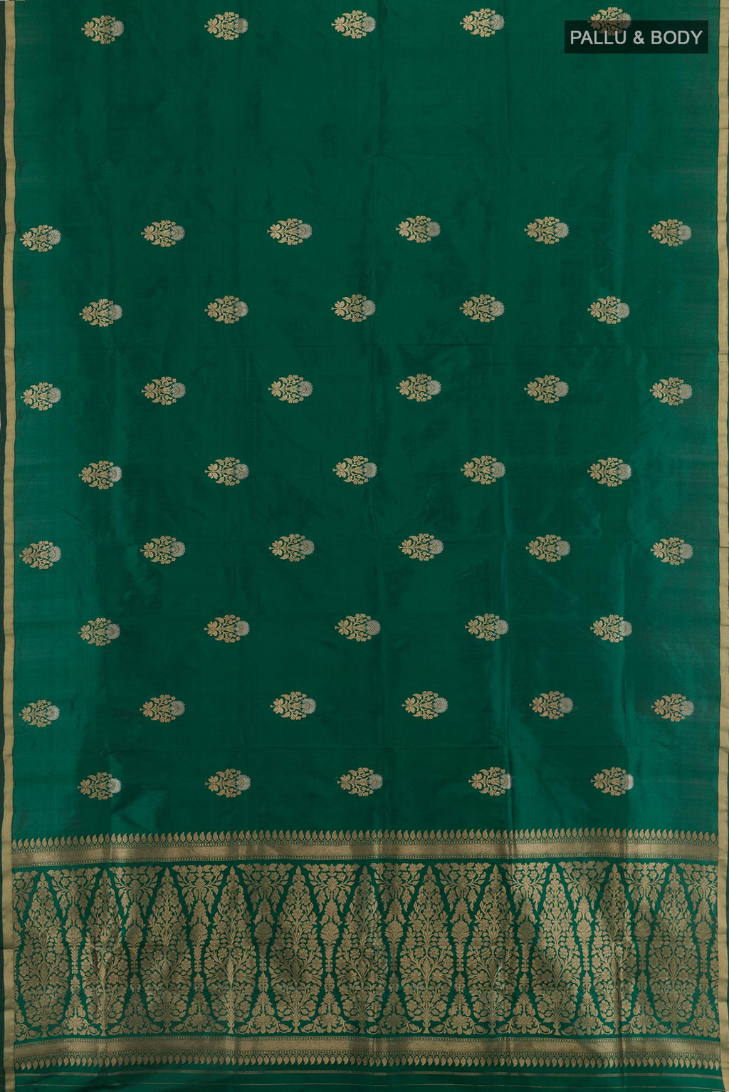 Flat view of Green Banarasi Katan Silk Saree with Zari Butta on the body and Zari Border. 