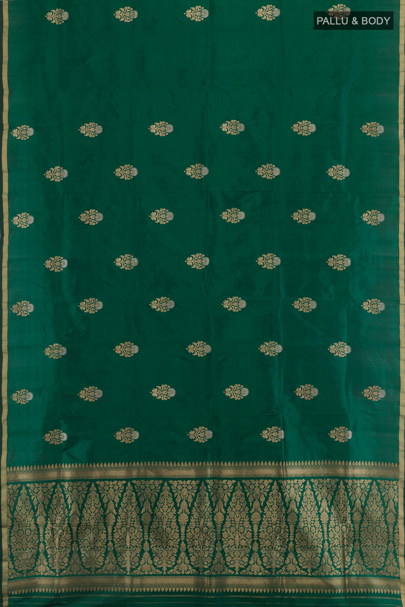 Flat view of Green Banarasi Katan Silk Saree with Zari Butta on the body and Zari Border. 
