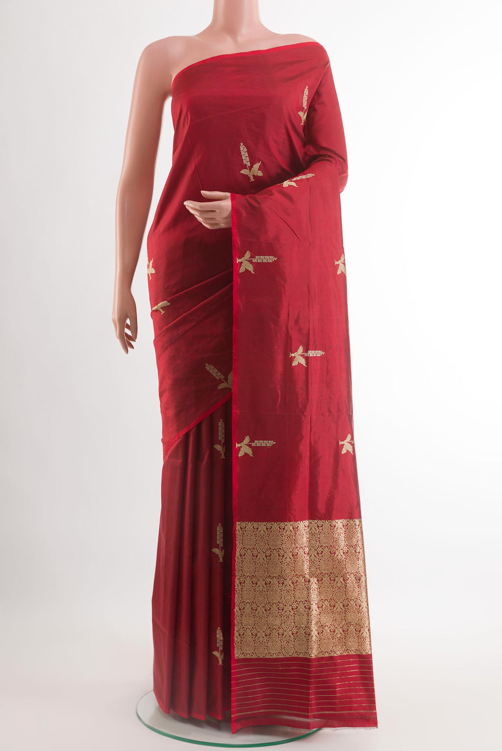 Red Banarasi Silk Saree with Zari Butta on the body and Zari Border.  displayed on a mannequin