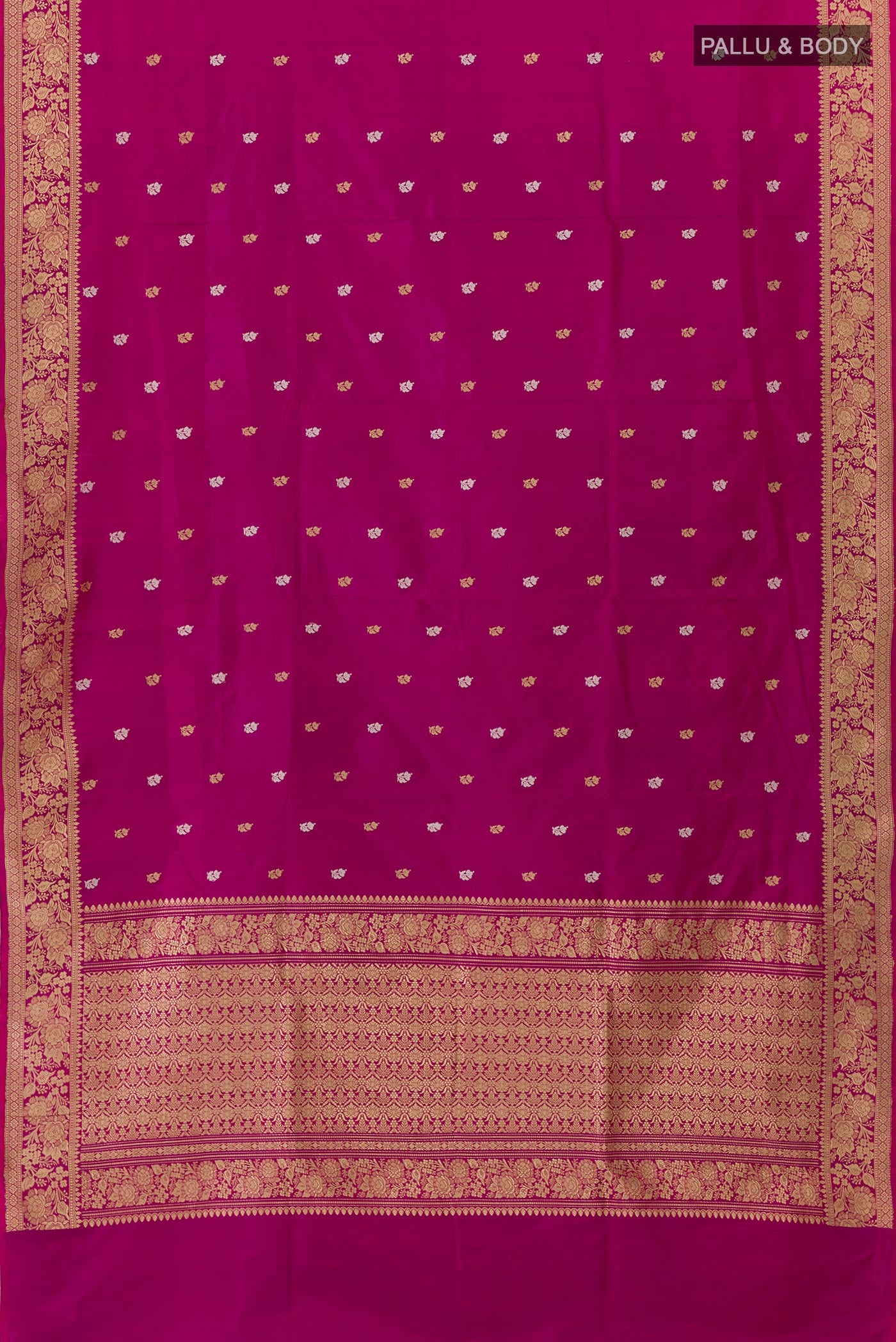 Flat view of Magenta Banarasi Katan Silk Saree with Zari And Thread Butta on the body and Zari Border. 