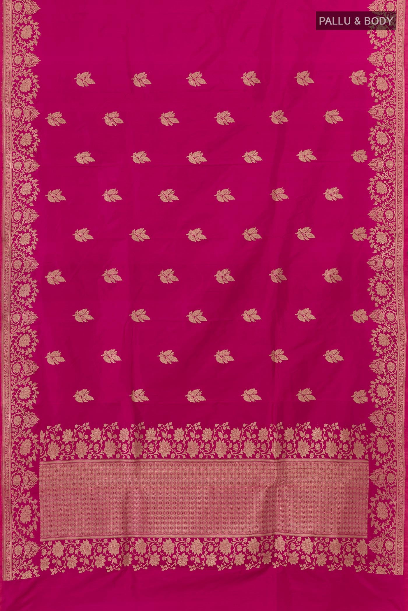 Flat view of Rani Pink Banarasi Katan Silk Saree with Zari Butta on the body and Zari Border. 