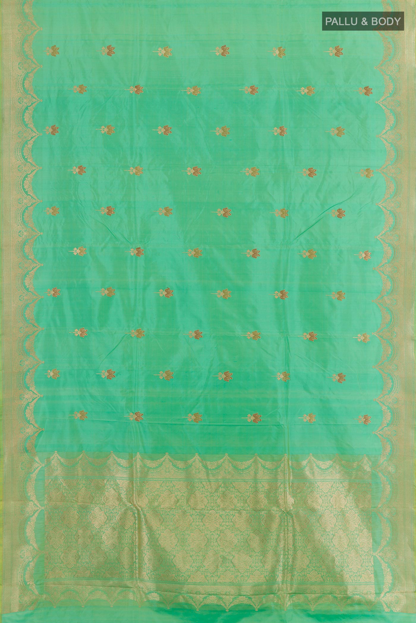 Flat view of Green Banarasi Katan Silk Saree with Zari Butta on the body and Zari Border. 