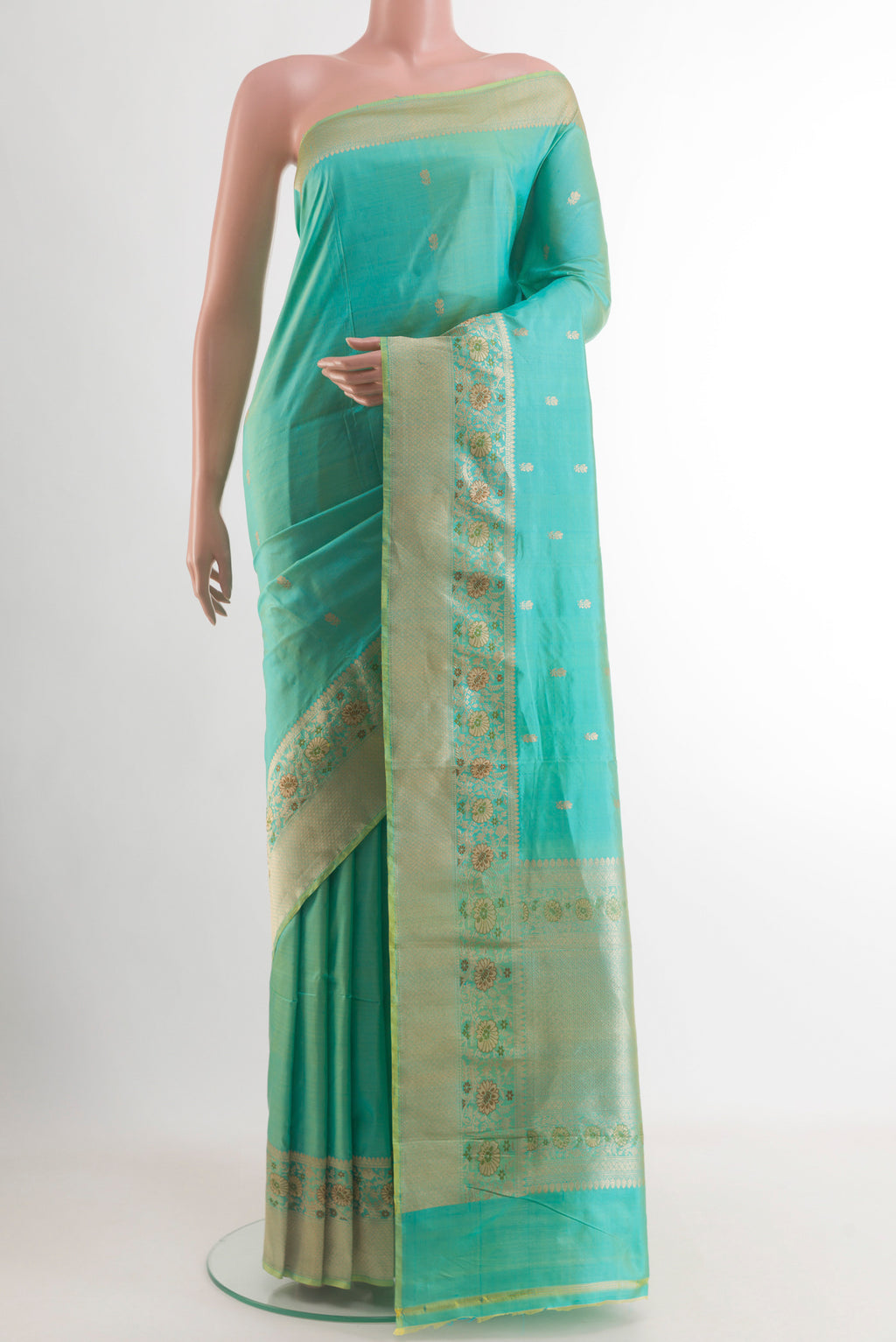 Sea Green Banarasi Katan Silk Saree with Zari Butta on the body and Zari Border.  displayed on a mannequin