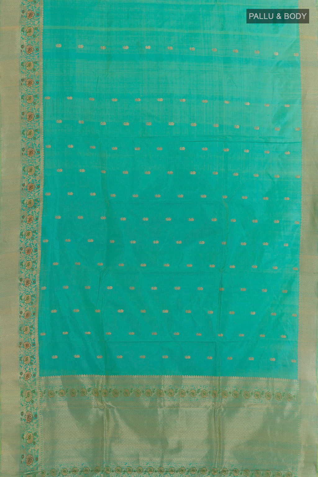 Flat view of Sea Green Banarasi Katan Silk Saree with Zari Butta on the body and Zari Border. 