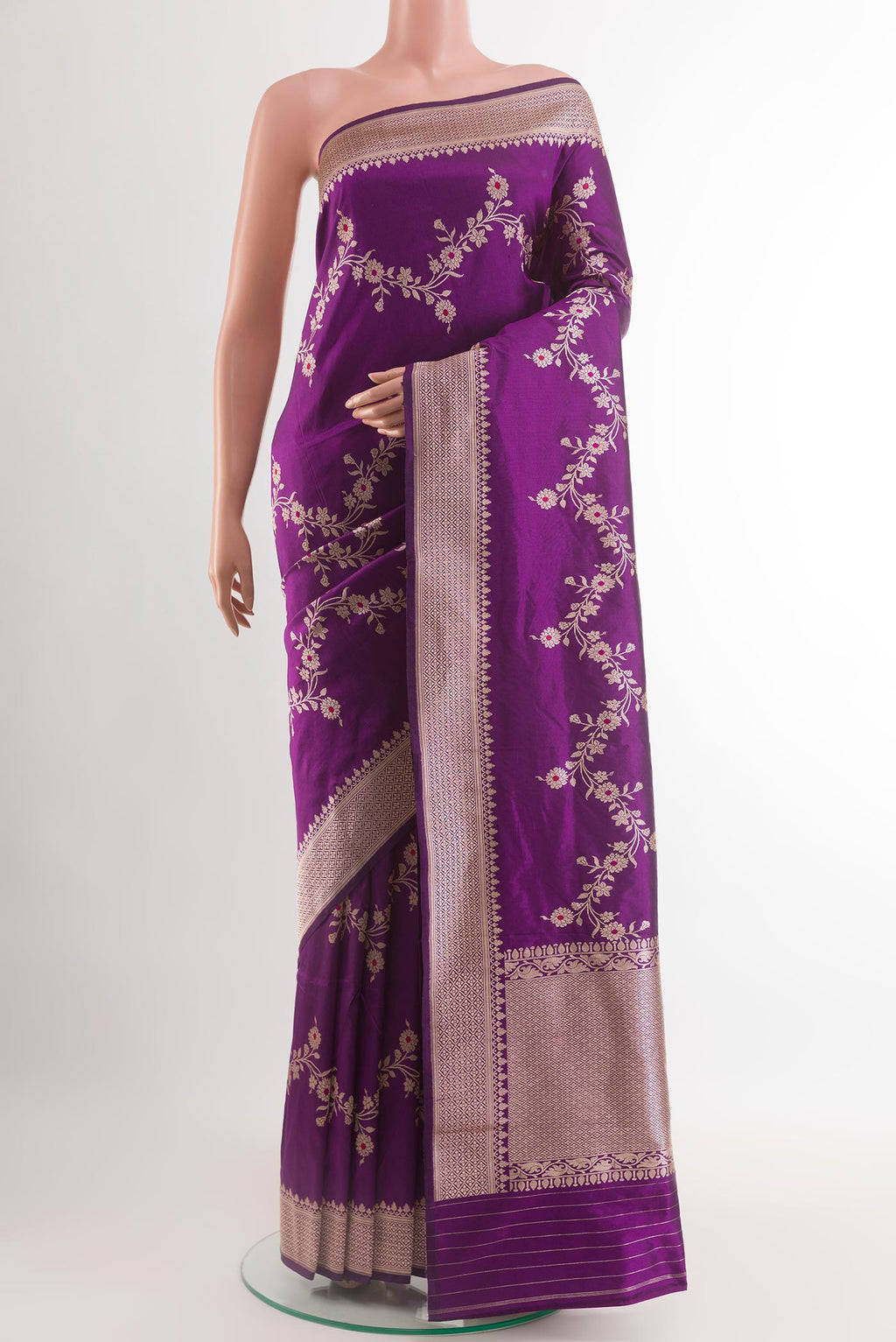 Purple Banarasi Katan Silk Saree with Zari Butta on the body and Zari Border.  displayed on a mannequin