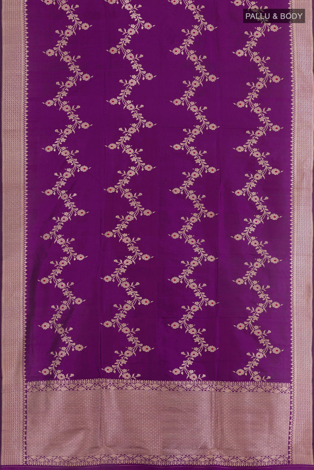 Flat view of Purple Banarasi Katan Silk Saree with Zari Butta on the body and Zari Border. 