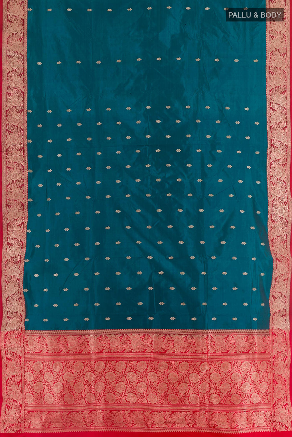 Flat view of Blue Banarasi Katan Silk Saree with Zari Butta on the body and Zari Border. 