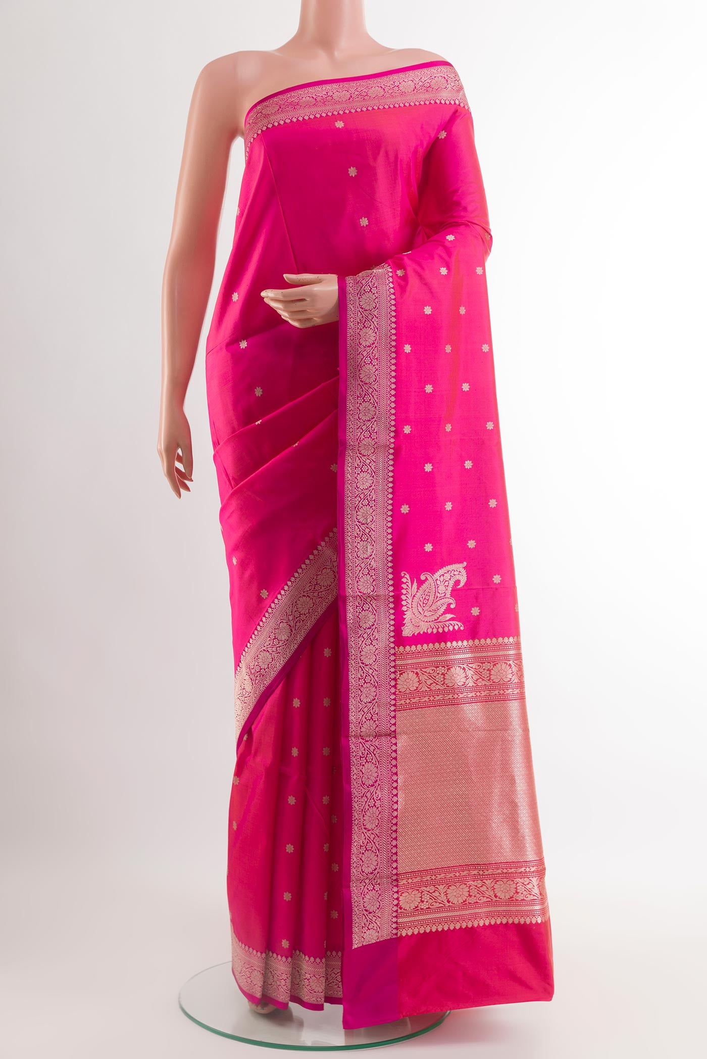Pink Banarasi Katan Silk Saree with Zari Butta on the body and Zari Border.  displayed on a mannequin