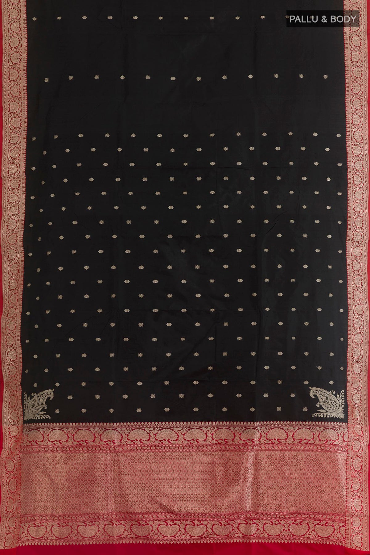 Flat view of Black Banarasi Silk Saree with Zari Butta on the body and Zari Border. 