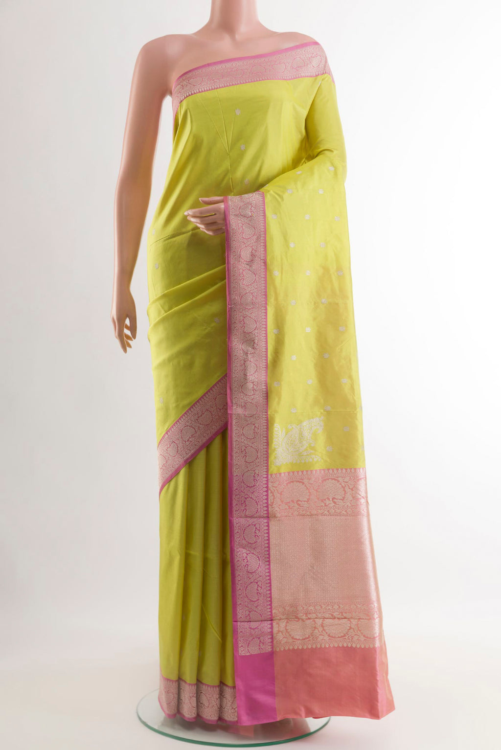 Lemon Yellow Banarasi Silk Saree with Zari Butta on the body and Zari Border.  displayed on a mannequin
