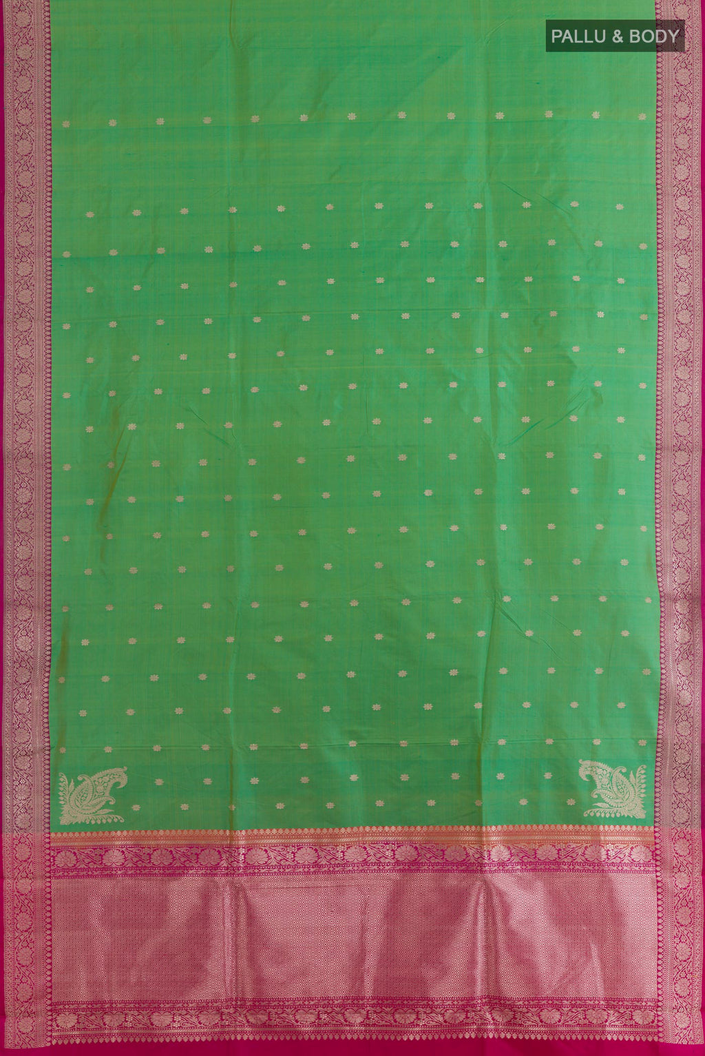 Flat view of Green Banarasi Silk Saree with Zari Butta on the body and Zari Border. 