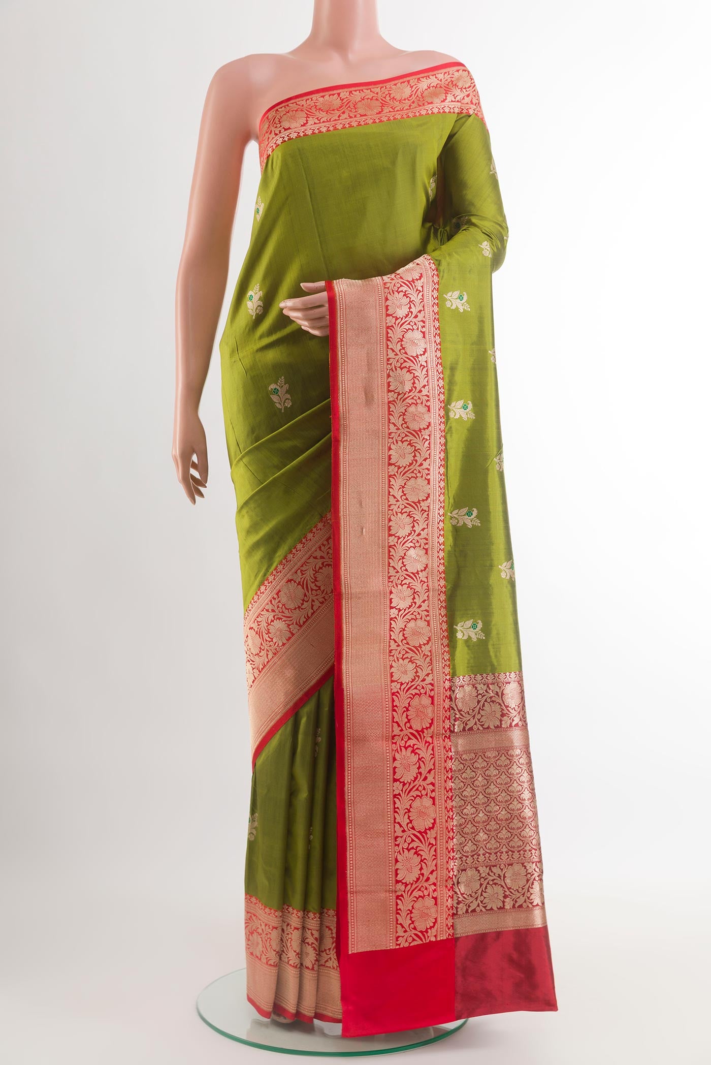 Mehandi Green Banarasi Katan Silk Saree with Zari Butta on the body and Zari Border.  displayed on a mannequin