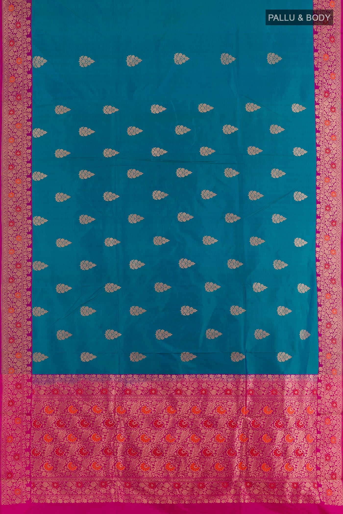 Flat view of Blue Banarasi Katan Silk Saree with Zari Butta on the body and Zari Border. 