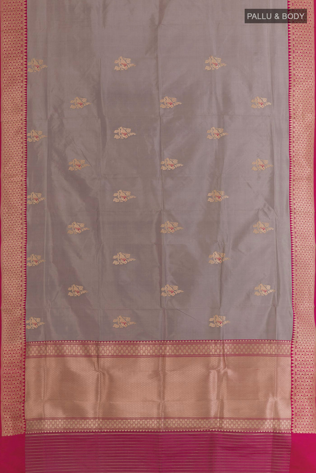 Flat view of Grey Banarasi Silk Saree with Zari Butta on the body and Zari Border. 