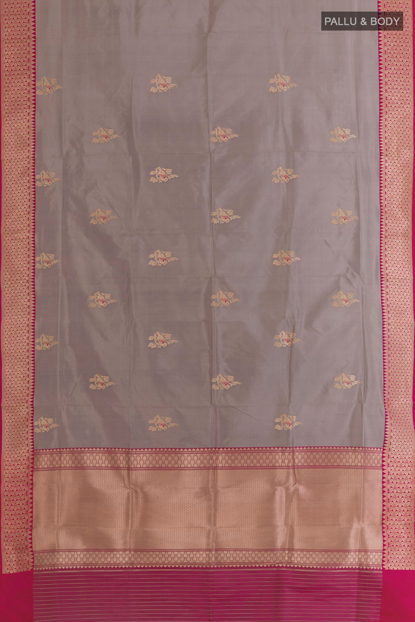 Flat view of Grey Banarasi Silk Saree with Zari Butta on the body and Zari Border. 