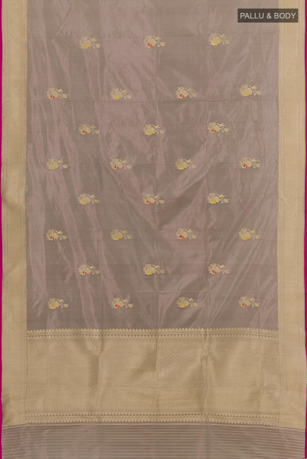 Flat view of Grey Banarasi Katan Silk Saree with Zari Butta on the body and Zari Border. 
