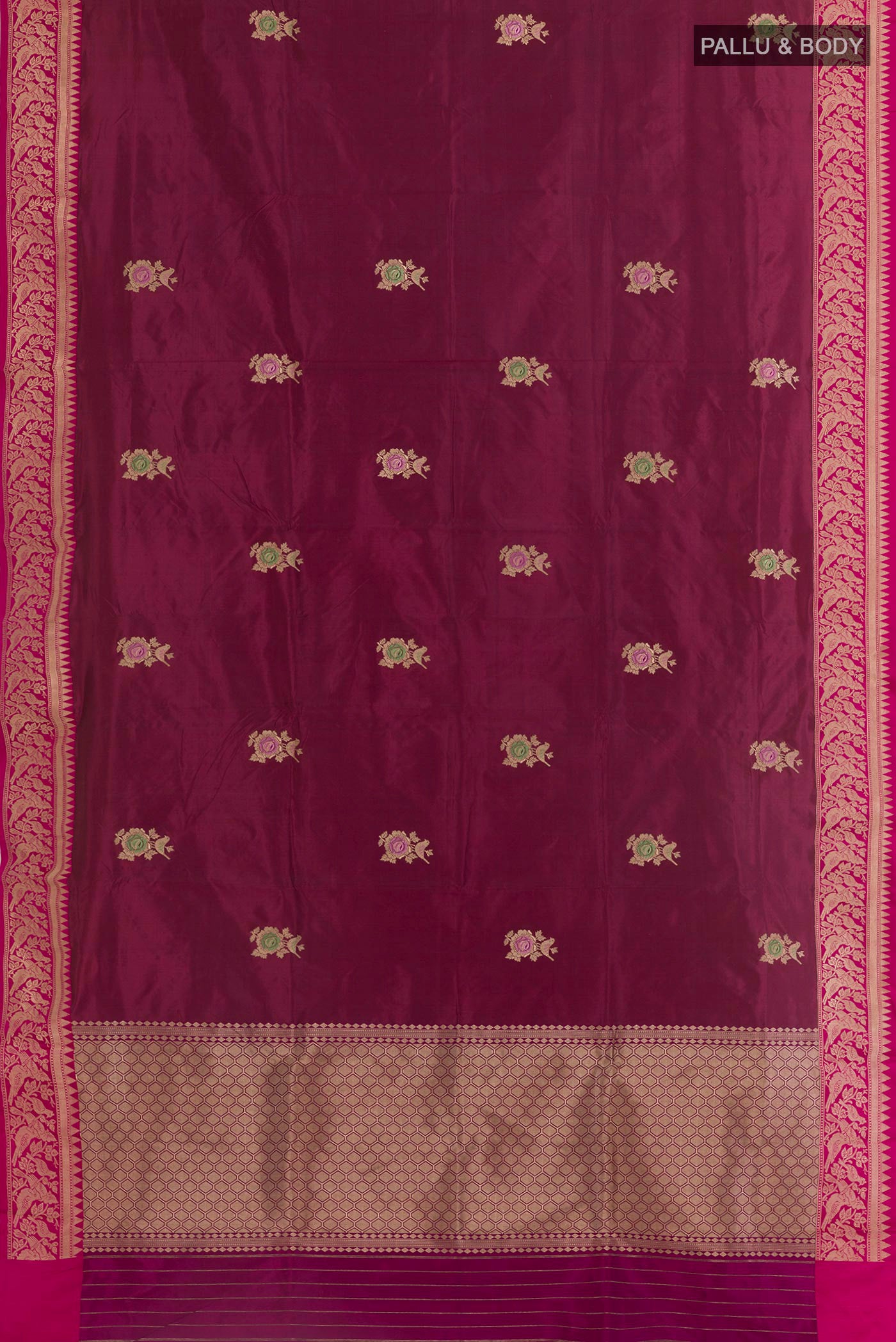 Flat view of Purple Banarasi Silk Saree with Zari Butta on the body and Zari Border. 