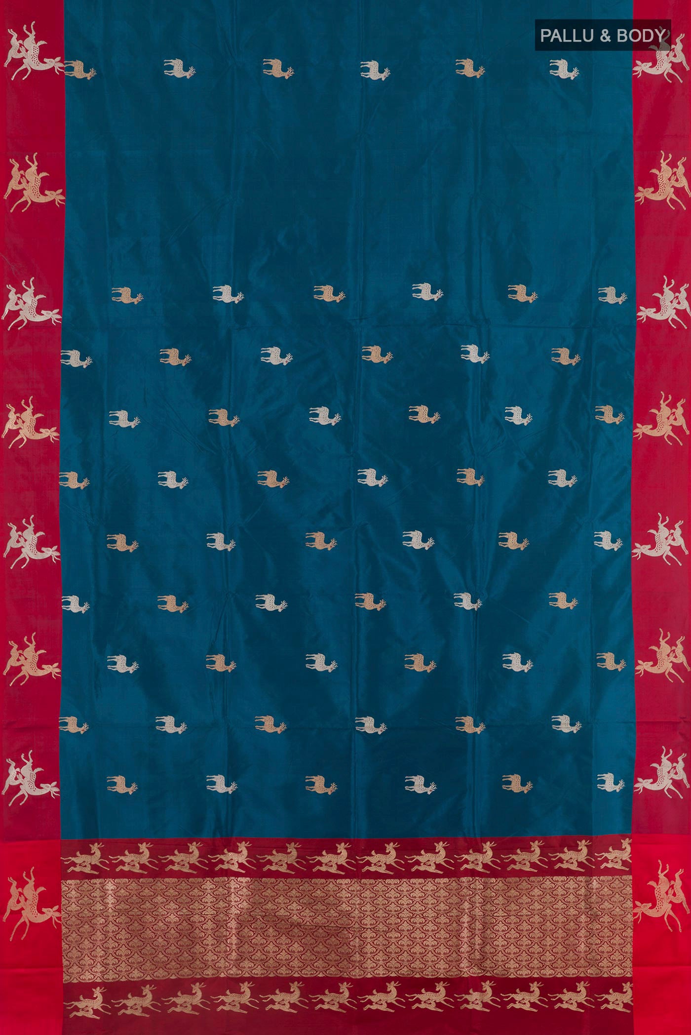 Flat view of Blue Banarasi Katan Silk Saree with Zari Butta on the body and Zari Border. 