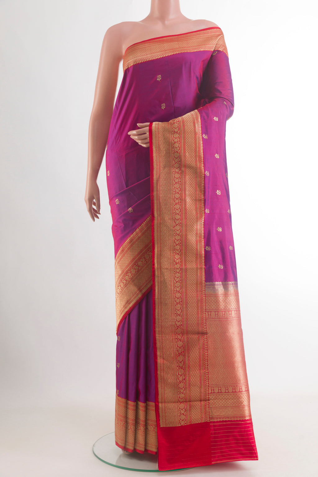 Purple Banarasi Katan Silk Saree with Zari Butta on the body and Zari Border.  displayed on a mannequin