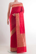 Red Banarasi Katan Silk Saree with Zari Butta on the body and Zari Border.  displayed on a mannequin