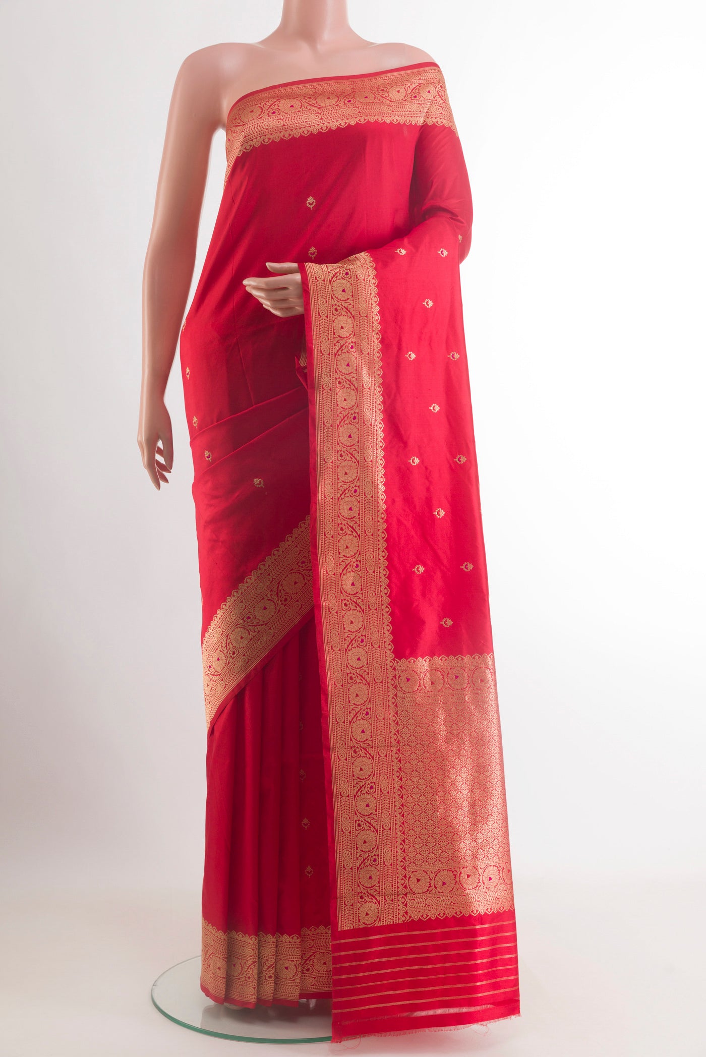 Red Banarasi Katan Silk Saree with Zari Butta on the body and Zari Border.  displayed on a mannequin