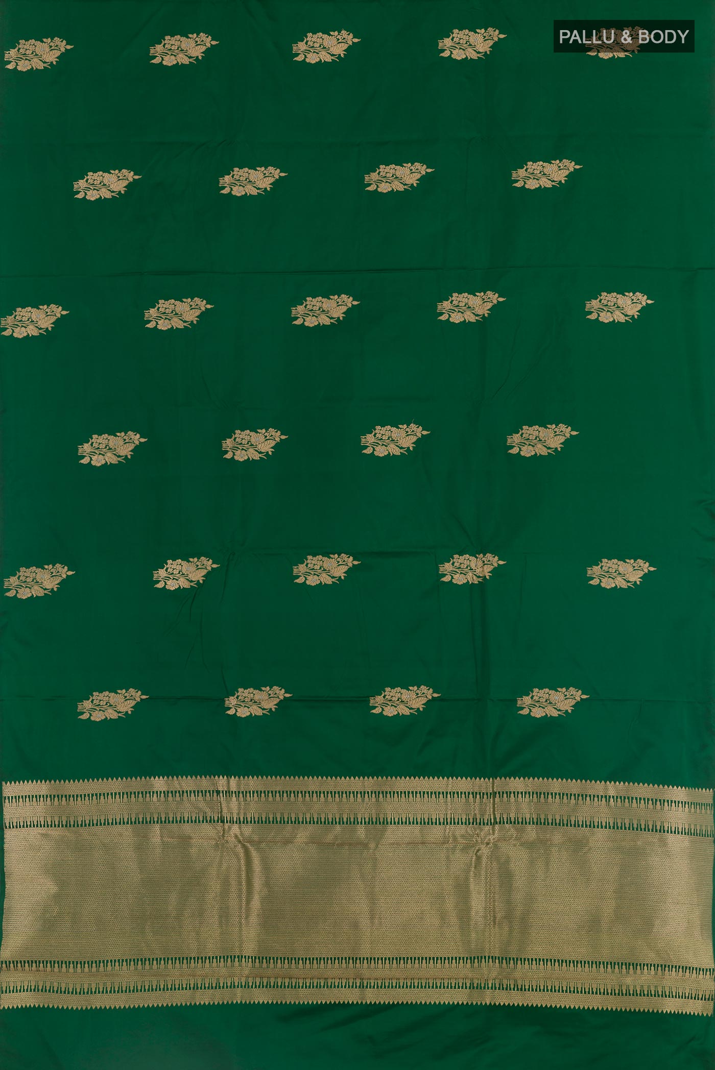 Flat view of Green Banarasi Silk Saree with Zari Butta on the body and Zari Border. 