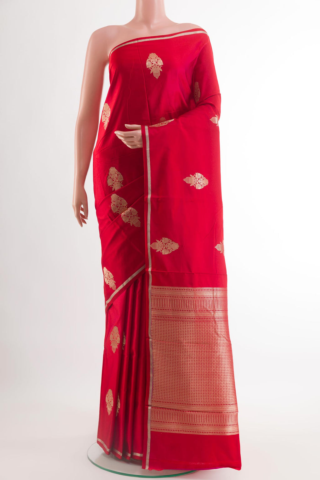 Red Banarasi Silk Saree with Zari Butta on the body and Zari Border.  displayed on a mannequin