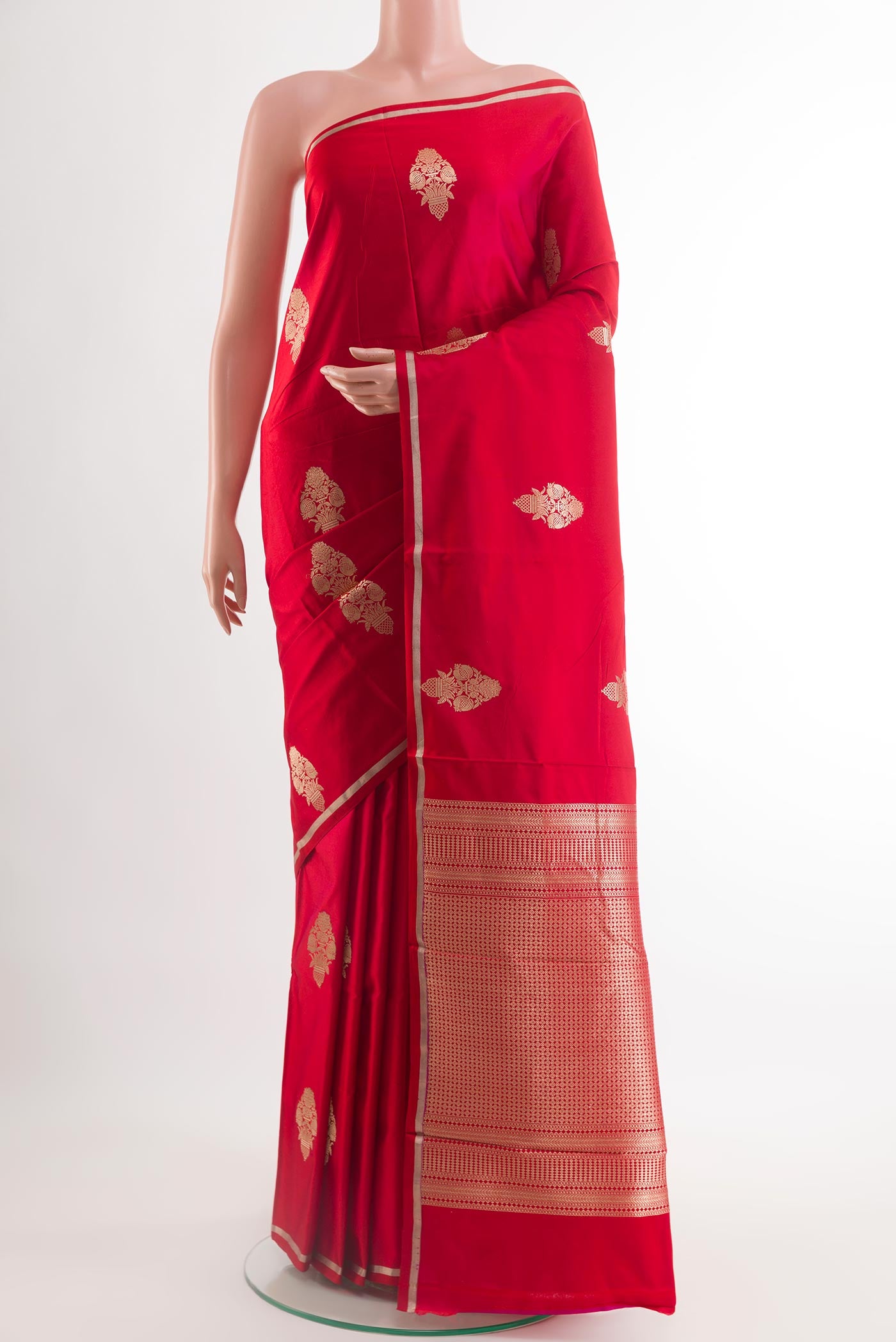 Red Banarasi Silk Saree with Zari Butta on the body and Zari Border.  displayed on a mannequin