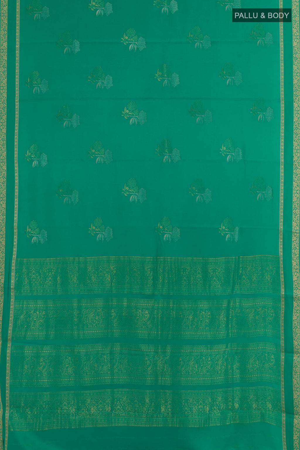 Flat view of Sea Green Mysore Crepe Saree with Zari Butta on the body and Zari Border. 