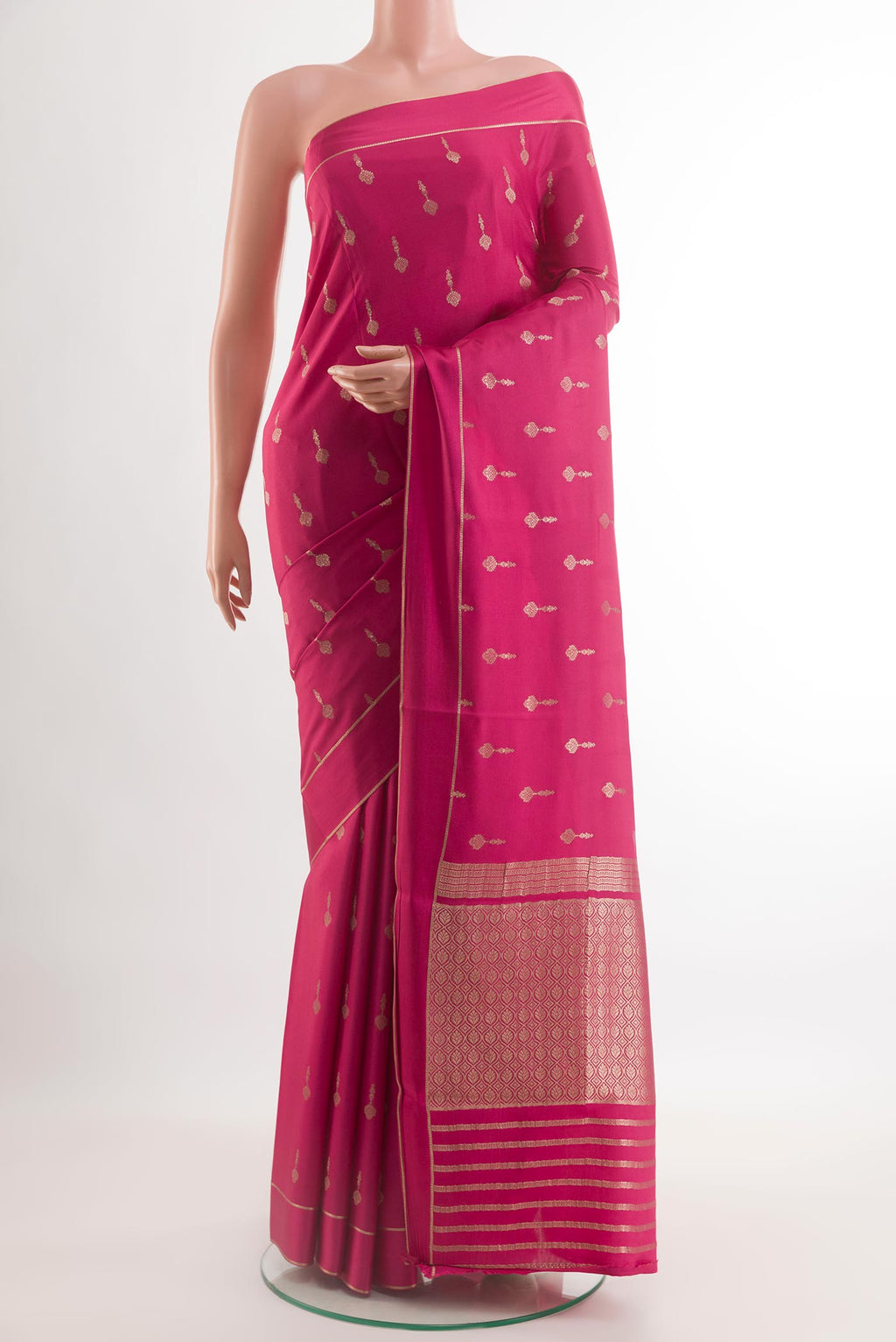 Pink Mysore Crepe Saree with Zari Butta on the body and Zari Border.  displayed on a mannequin