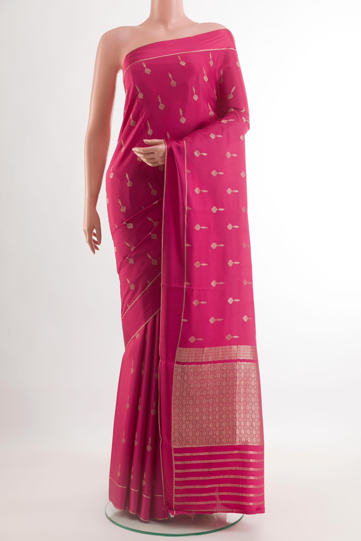 Pink Mysore Crepe Saree with Zari Butta on the body and Zari Border.  displayed on a mannequin