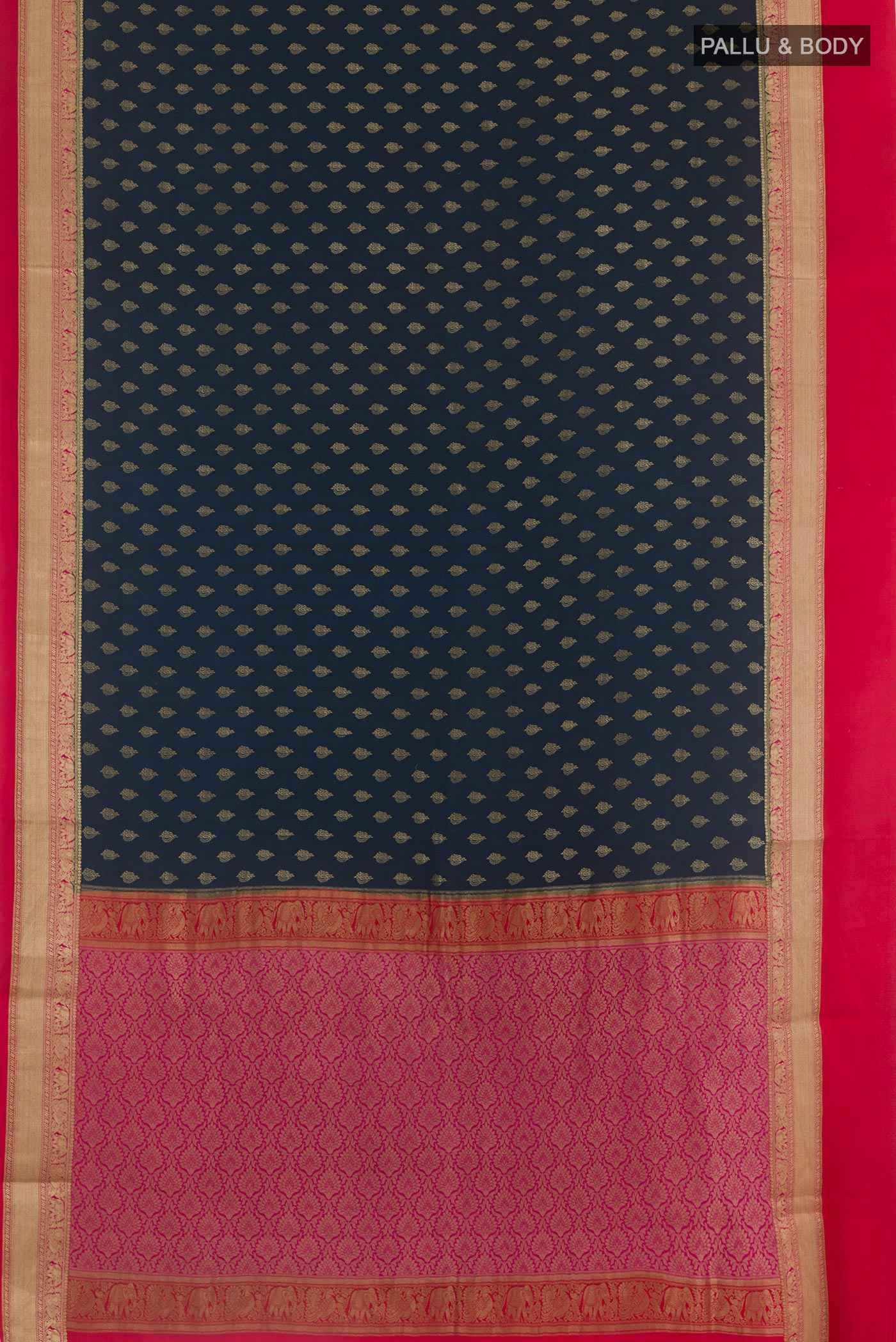 Flat view of Blue Mysore Crepe Saree with Zari Butta on the body and Zari Border. 