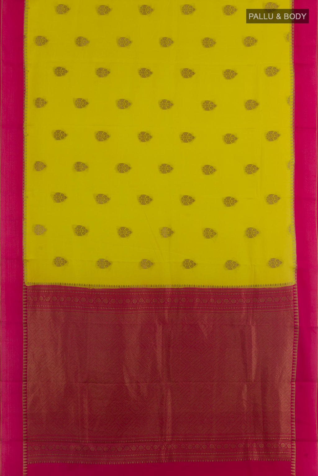 Flat view of Yellow Mysore Crepe Saree with Zari Butta on the body and Zari Border. 