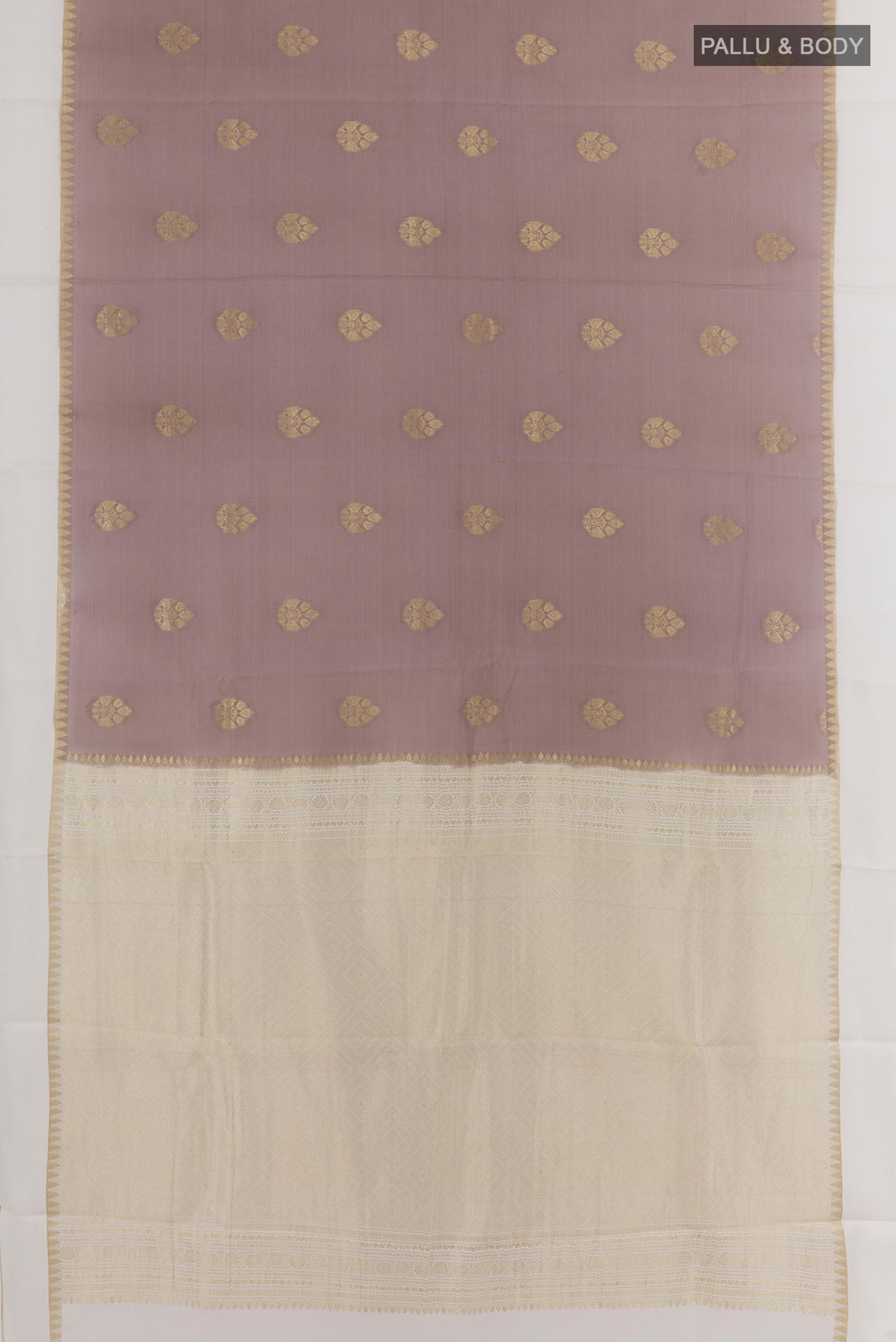 Flat view of Brown Mysore Crepe Saree with Zari Butta on the body and Zari Border. 