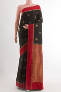 Black Mysore Silk Saree with Zari Butta on the body and Zari Border.  displayed on a mannequin
