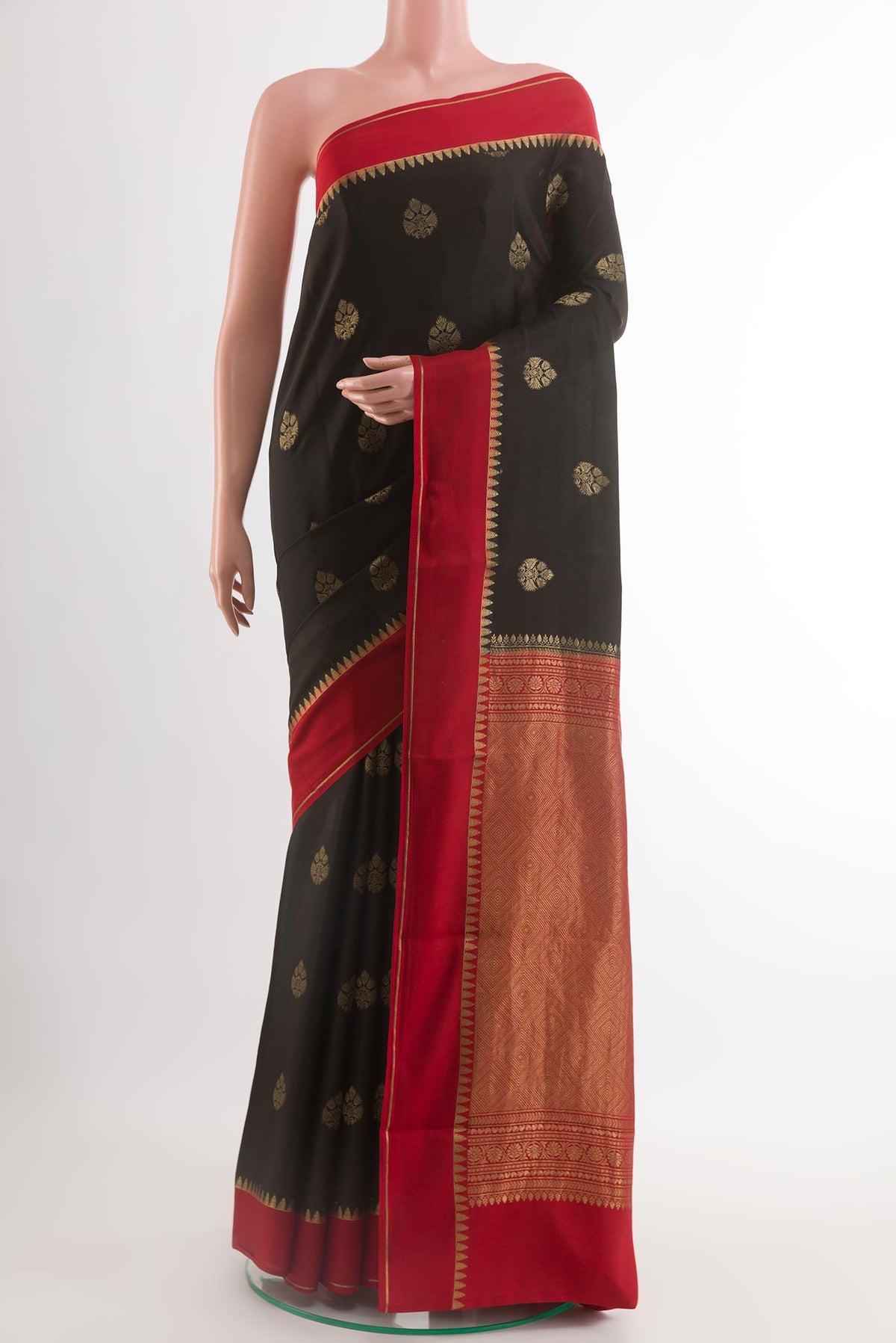 Black Mysore Silk Saree with Zari Butta on the body and Zari Border.  displayed on a mannequin