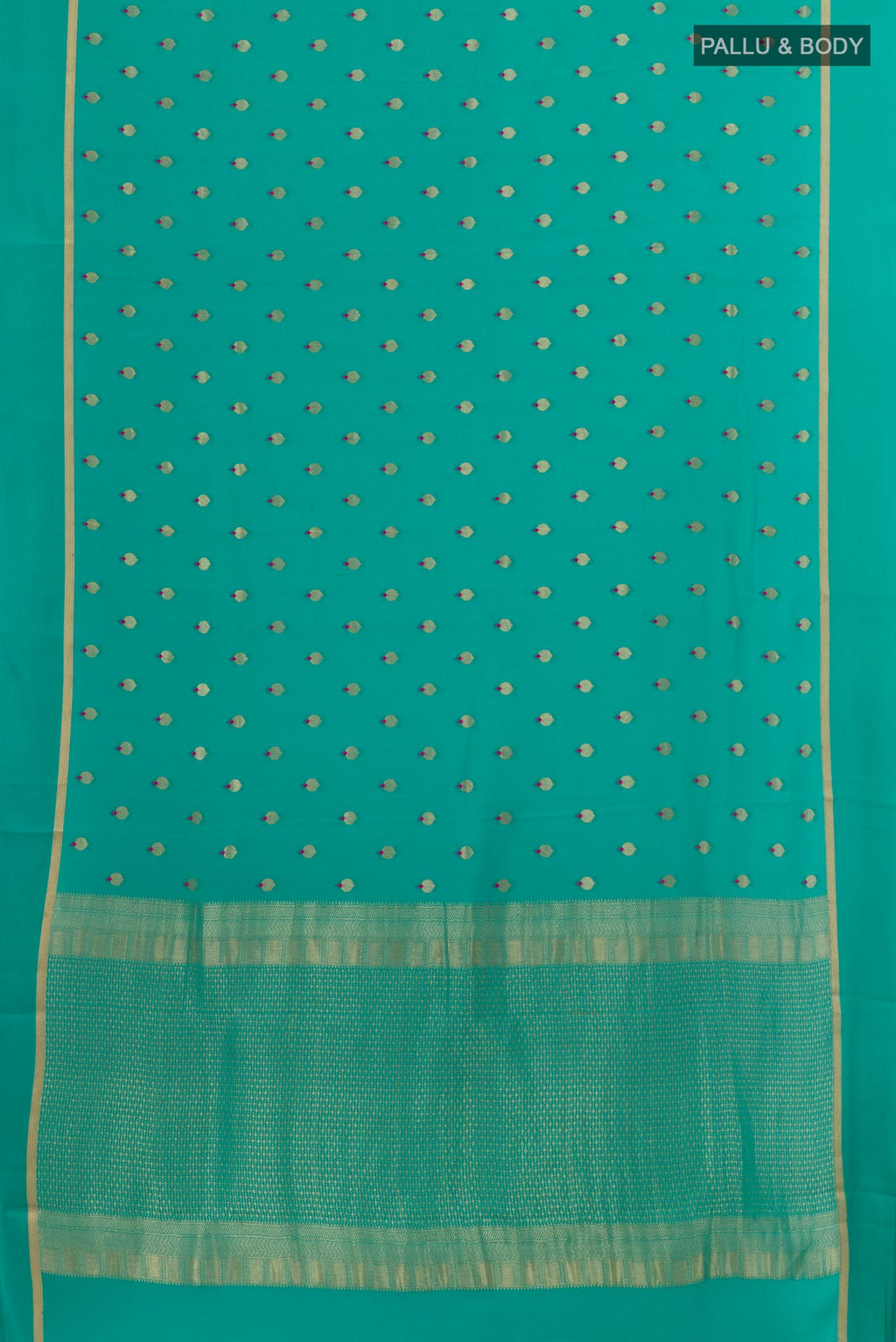 Flat view of Sea Green Mysore Crepe Saree with Zari Butta on the body and Zari Border. 