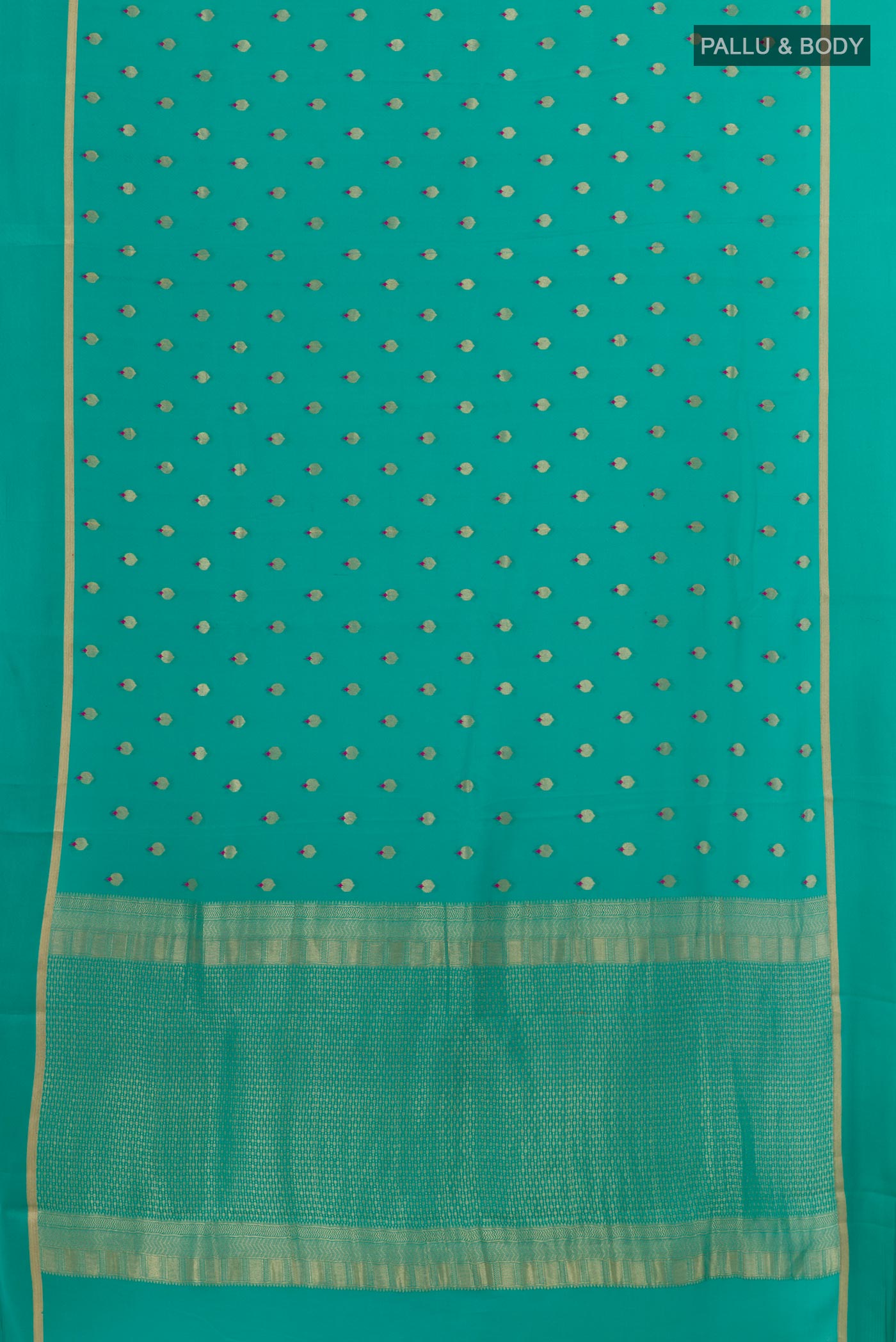 Flat view of Sea Green Mysore Crepe Saree with Zari Butta on the body and Zari Border. 
